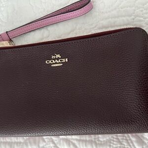 Coach Dark Purple Wristlet with Pink Strap